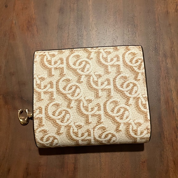 Coach Handbags - Coach Tan and Cream Logo Wallet